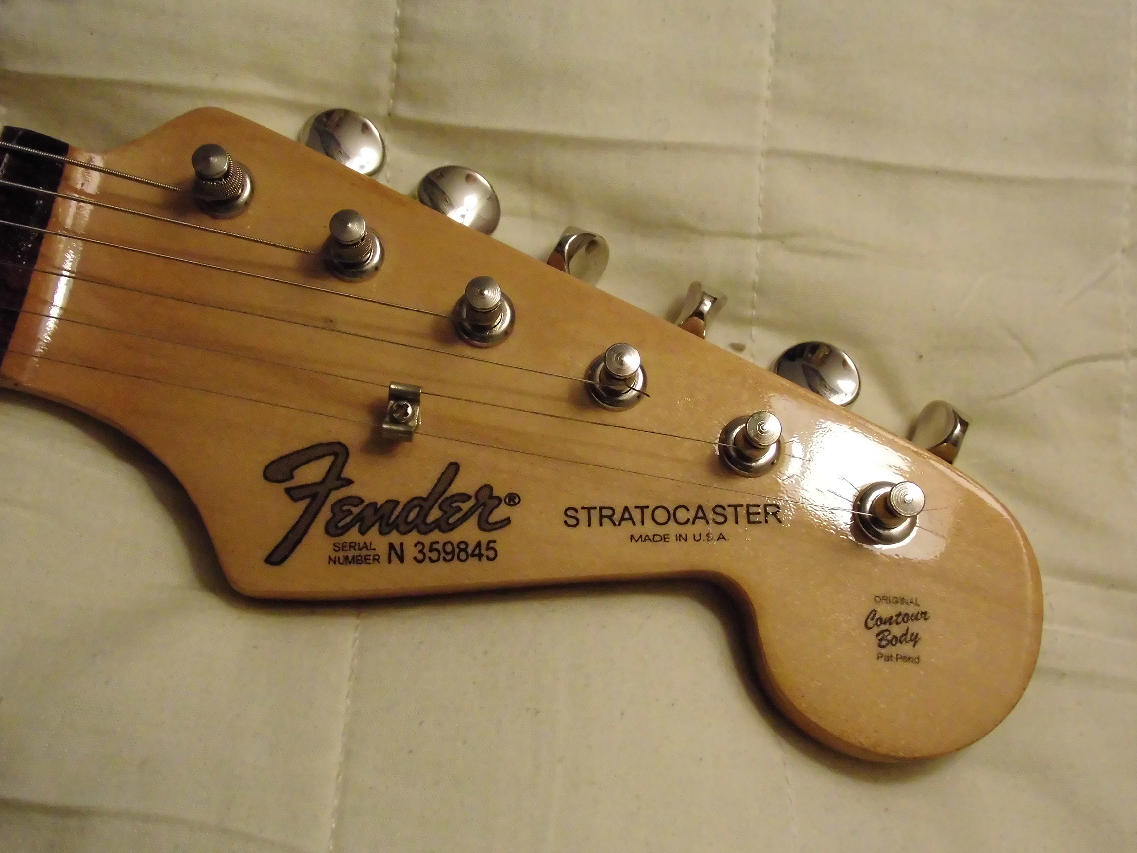 Need help identifying a Squier/Fender Strat... Fender Stratocaster